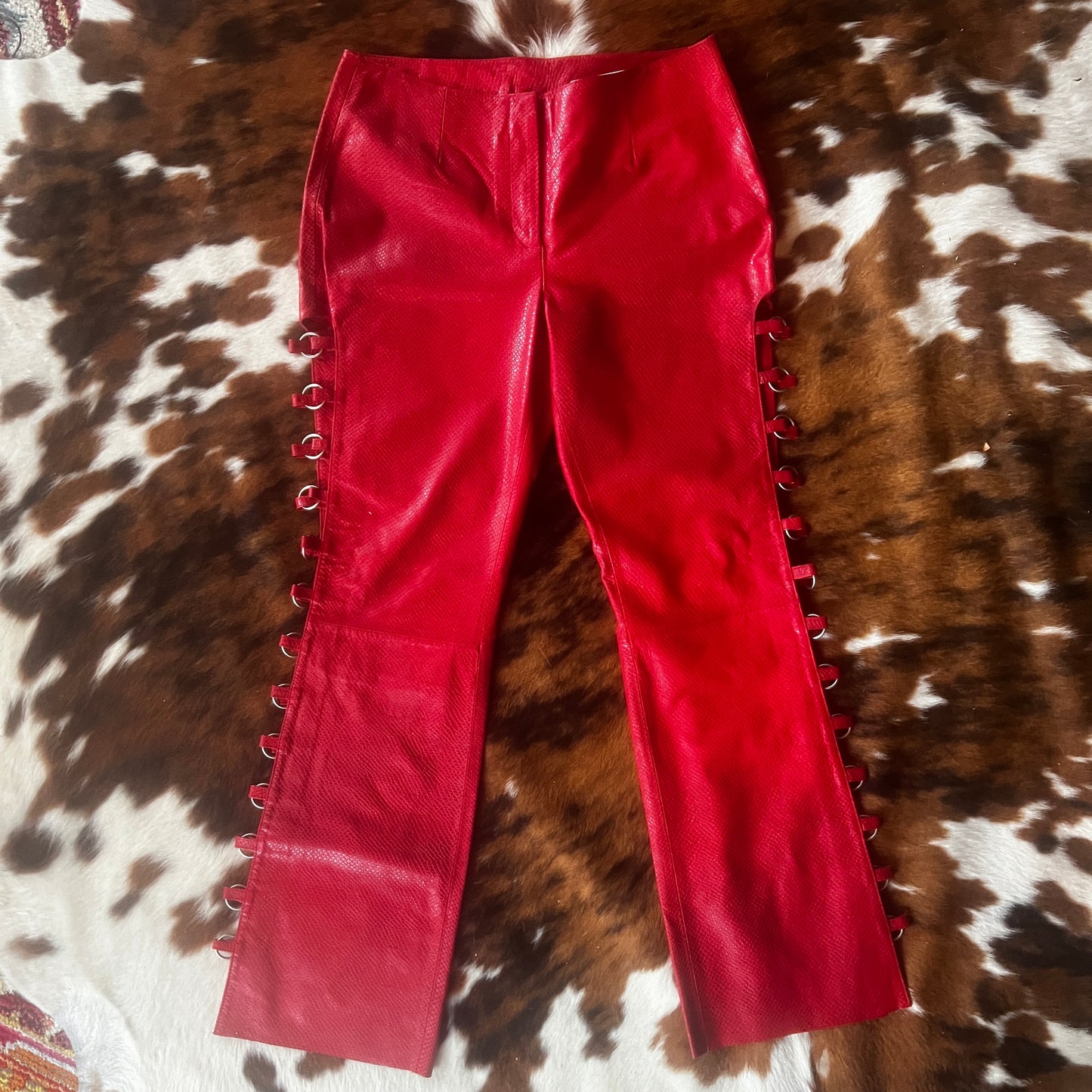 Wilson’s red leather cut out pants